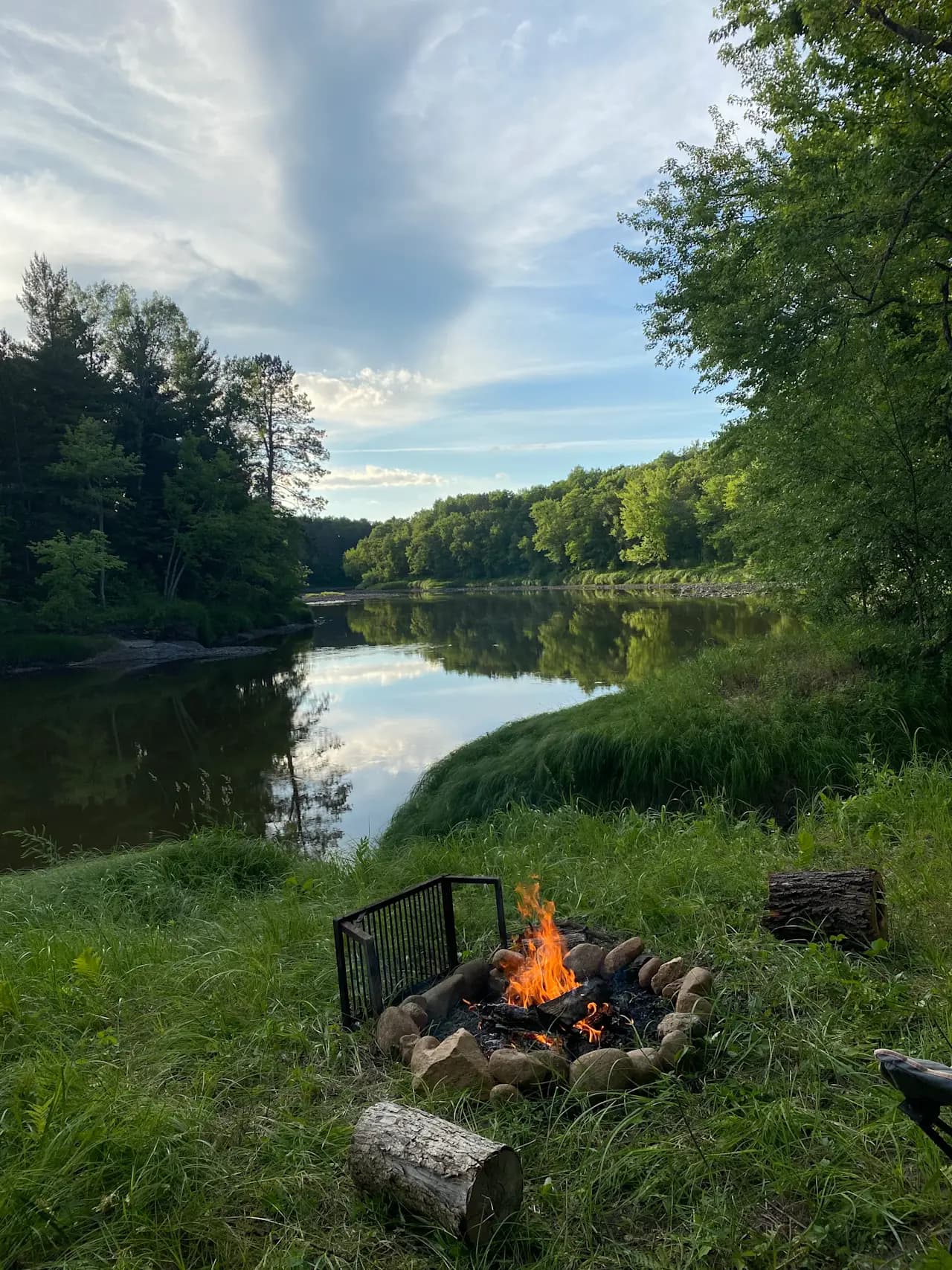 Rustic riverside campsite at Cuyuna Crossing